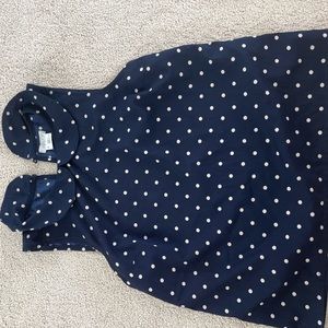 White and navy polka dot short sleeved blouse in size S